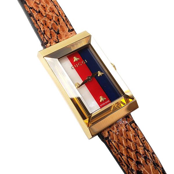 Gucci G-Frame watch angled view showing mother of pearl dial and brown snakeskin leather strap