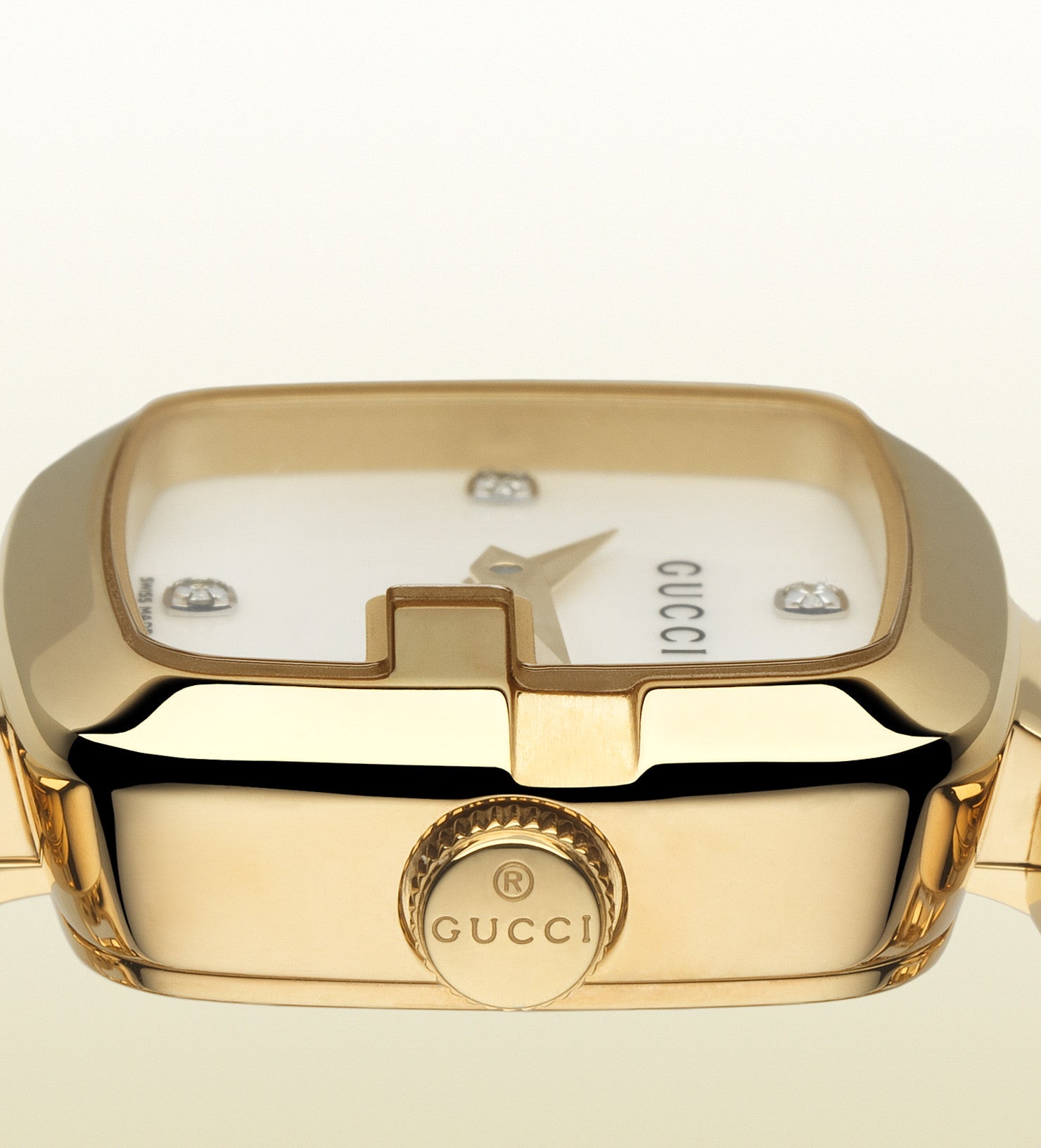 Close-up of Gucci G-Gucci Diamonds watch dial showing mother of pearl and diamond details