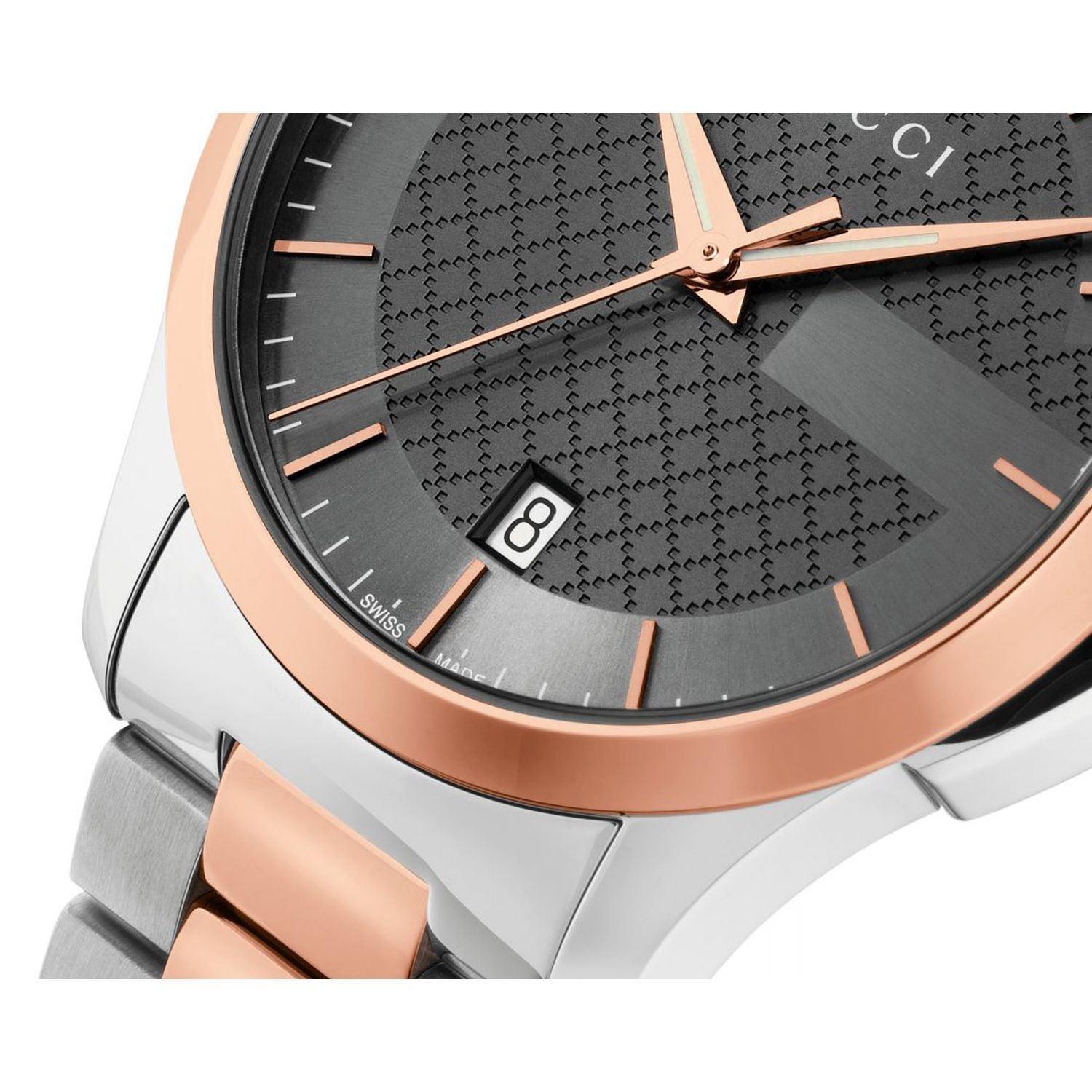 Gucci G-Timeless 27mm dial detail showing rose gold indices and hands