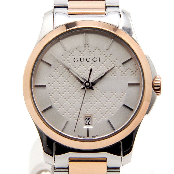 Gucci G-Timeless 27mm dial detail showing GG quilted motif and hour markers