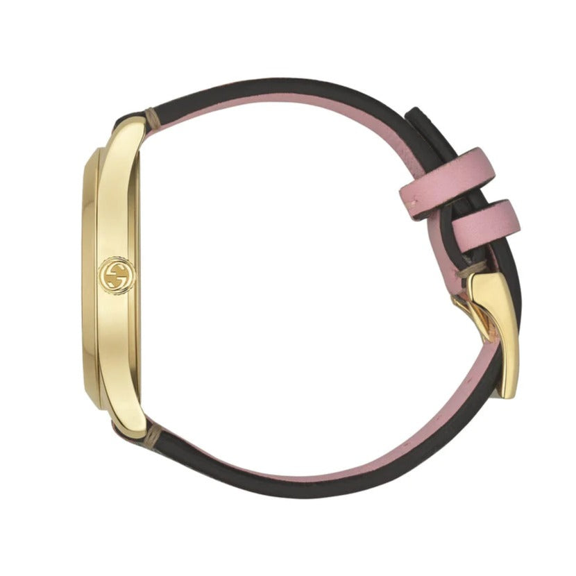Flat lay view of Gucci G-Timeless watch strap showing strawberry-print fabric and pink backing