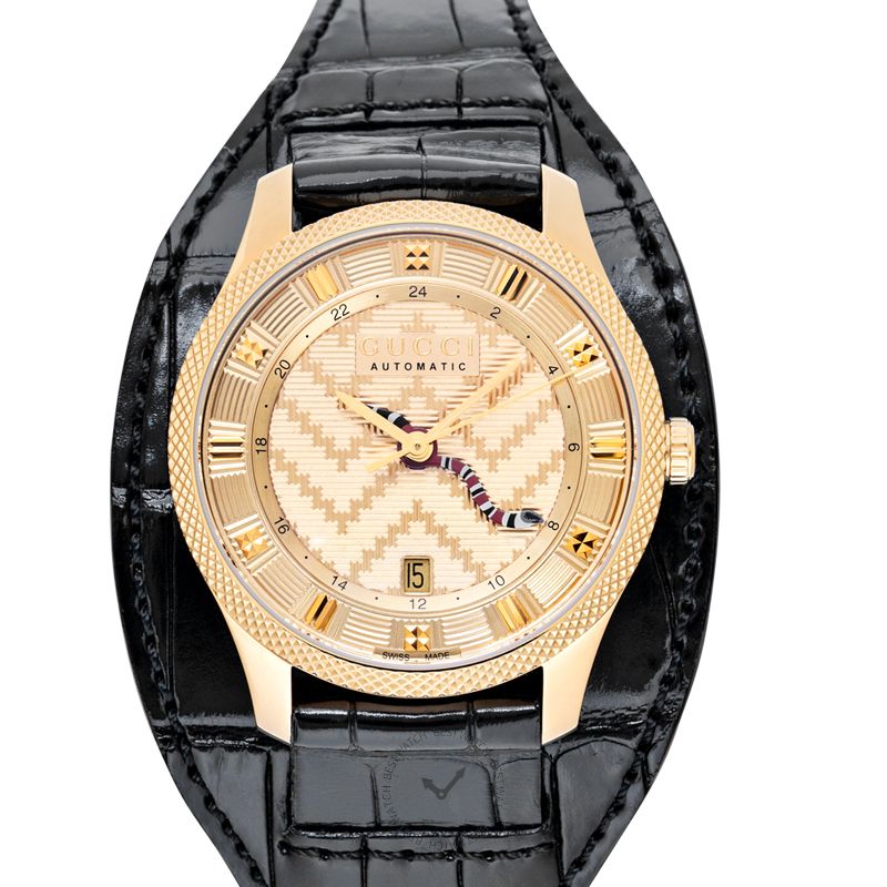 Gucci G-Timeless automatic watch with gold-tone dial, stainless steel case, and black strap
