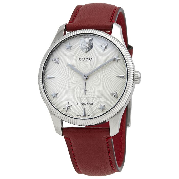 Gucci G-Timeless automatic watch with stainless steel case, silver dial, and red leather strap