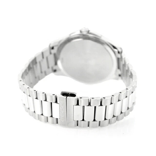 Gucci G-Timeless watch caseback showing steel case and bracelet construction
