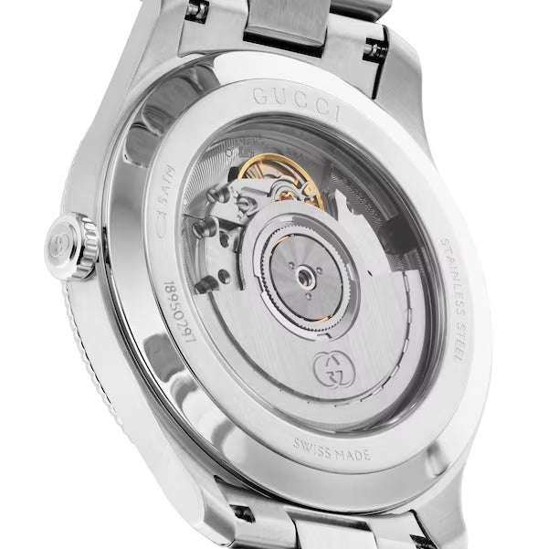 Gucci G-Timeless caseback showing automatic movement with exposed balance wheel and Gucci branding