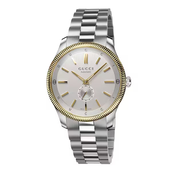 Gucci G-Timeless watch with silver dial, gold bezel, and steel two-tone bracelet