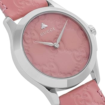 Gucci G-Timeless YA1264030 watch worn on wrist showing candy pink dial