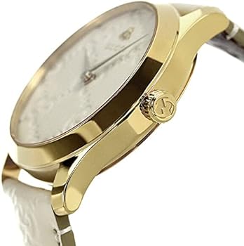 Gucci G-Timeless side view showing gold case profile and white strap