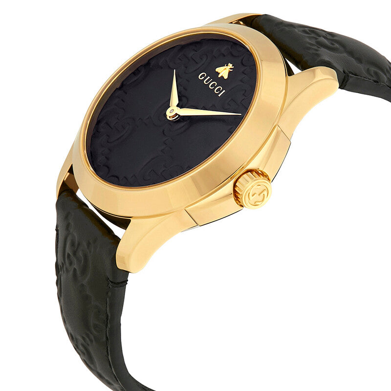 Angled view of Gucci G-Timeless watch showing black GG textured dial and gold case profile