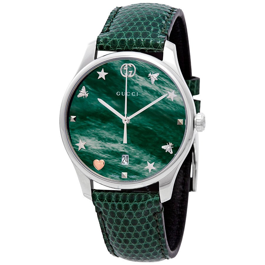 Gucci G-Timeless ladies watch with green mother of pearl dial, charm hour markers, steel case, and green leather strap
