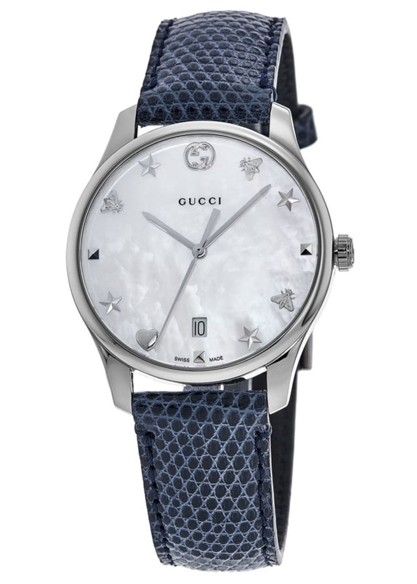 Gucci G-Timeless women's watch with mother of pearl dial, star markers, stainless steel case and blue strap