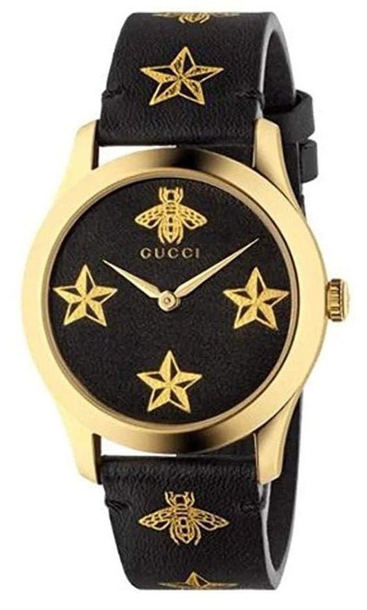 Gucci G-Timeless watch with gold-tone case, black dial, gold star and bee design, black leather strap
