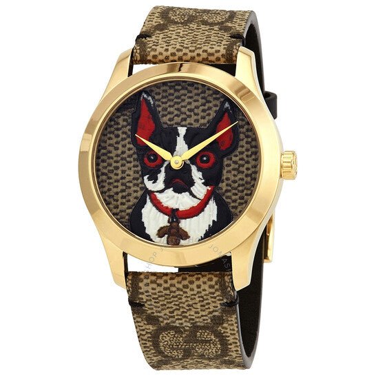 Gucci G Timeless watch at angle showing goldtone case and brown leather strap