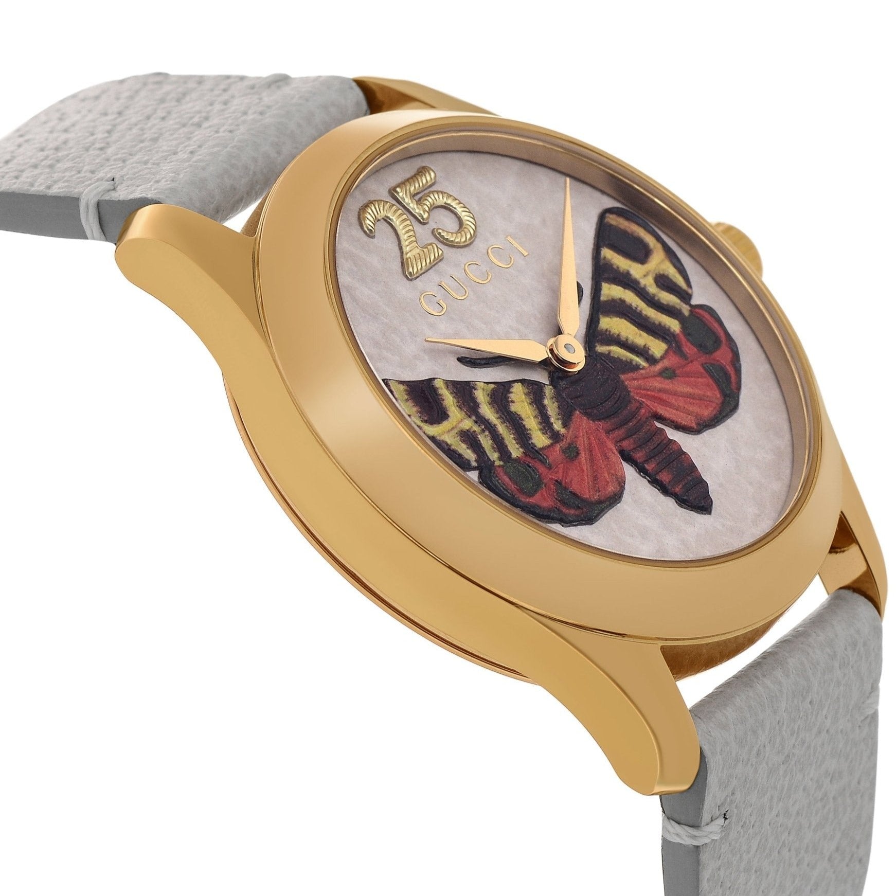 Gucci G-Timeless watch side view displaying gold case profile and cream leather strap