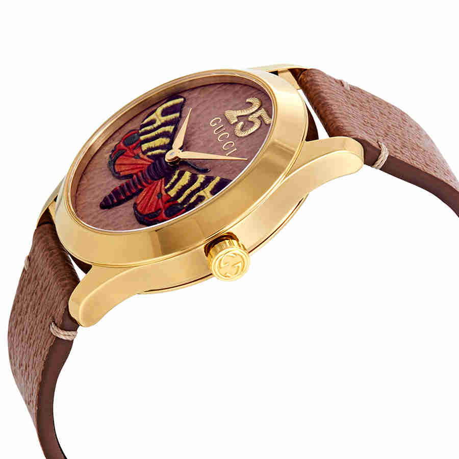 GUCCI G-Timeless watch angled view showing butterfly dial detail and case profile