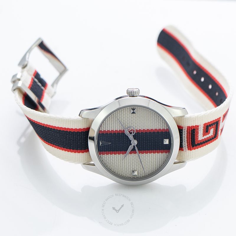 G-Timeless YA1264071 three-quarter angle view showing striped fabric strap and silver case