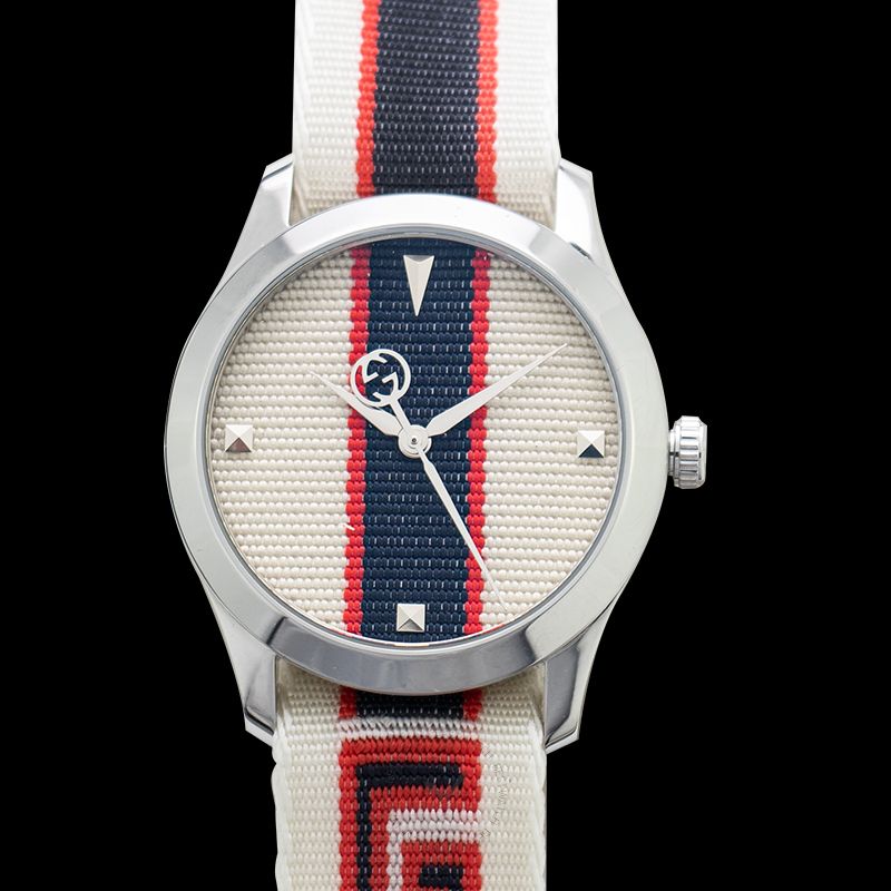 Gucci G-Timeless YA1264071 front view with Gucci text visible on striped strap