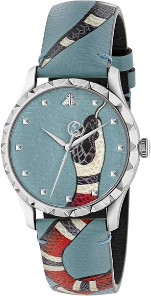 Gucci G-Timeless watch with blue dial featuring kingsnake head print and blue leather strap with kingsnake design