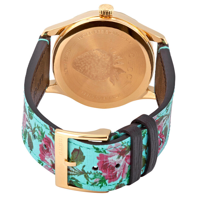 Back view of watch caseback showing gold-tone case and floral leather strap with buckle