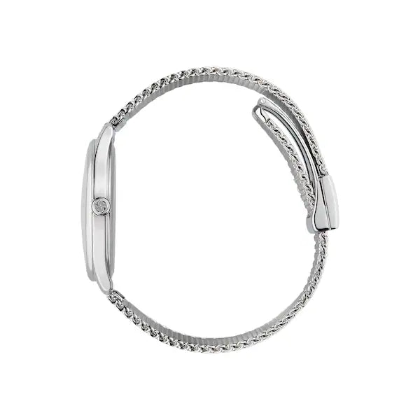 Gucci G-Timeless diamond ladies watch displayed on wrist with mesh band