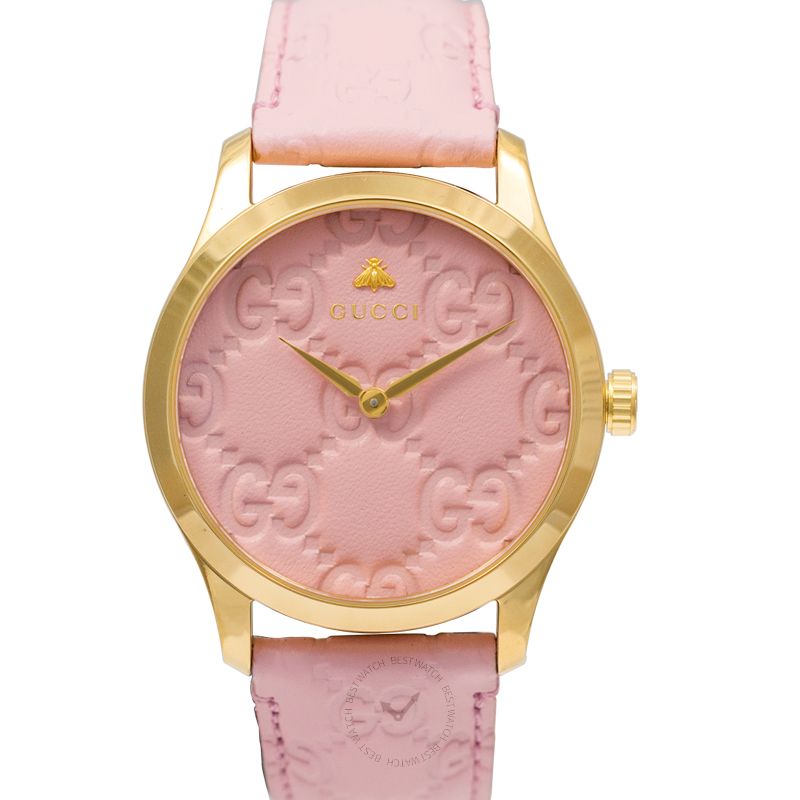 Gucci G-Timeless quartz watch with pastel pink dial, gold-tone case, GG pattern, and pink leather strap