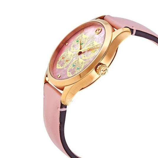 Angled side view of Gucci G-Timeless women's watch with pink dial and pink leather strap