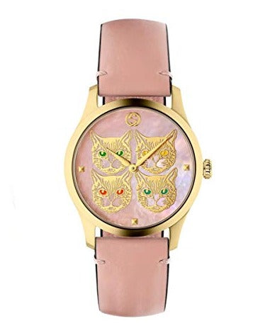 Front view of Gucci G-Timeless women's watch with four cat design on pink dial and gold case