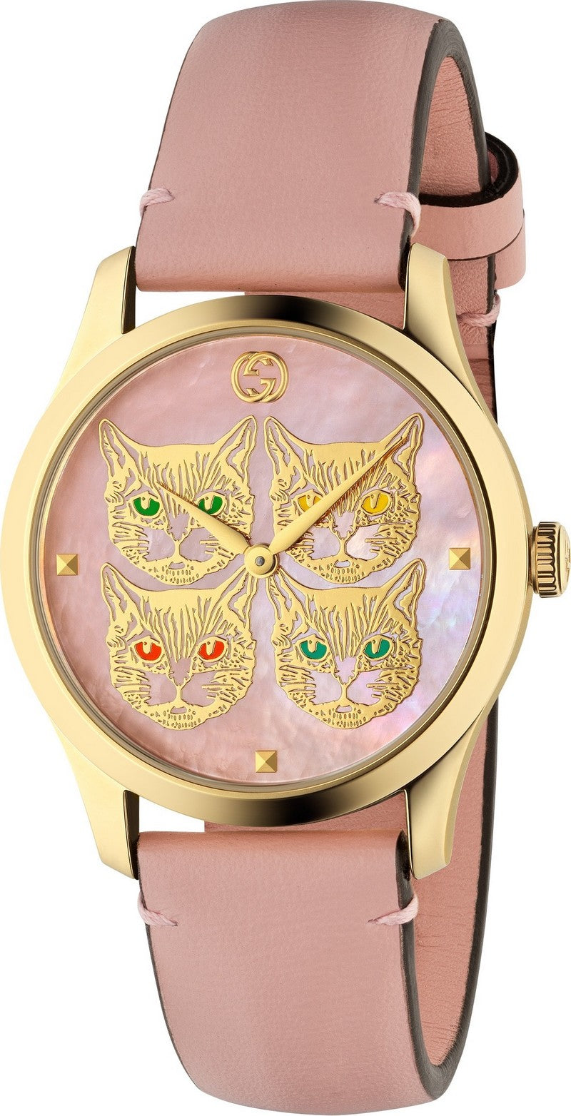 Gucci G-Timeless watch with four cat faces on pink mother-of-pearl dial, gold-tone case, pink leather strap