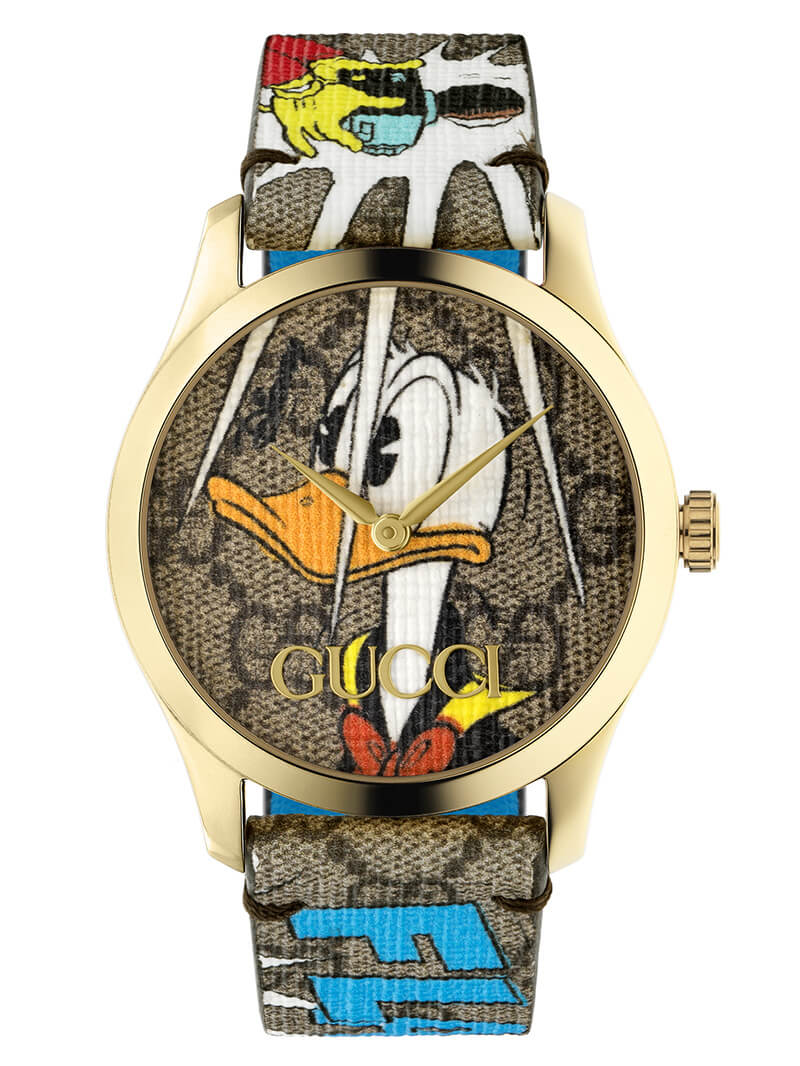 Front view of Gucci G Timeless YA1264167 with Donald Duck character on dial and patterned strap