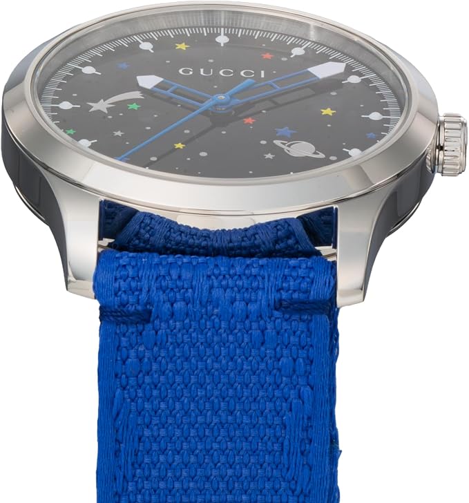 Angled view of Gucci G-Timeless watch showing black dial with blue hands and space-themed markers