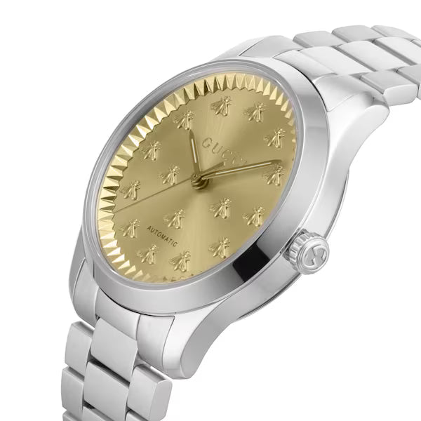 Gucci G-Timeless watch angled view with champagne dial and bee indexes