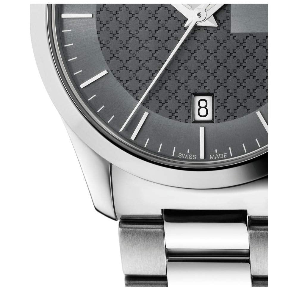 Close-up detail of Gucci G-Timeless dial with date window and markers