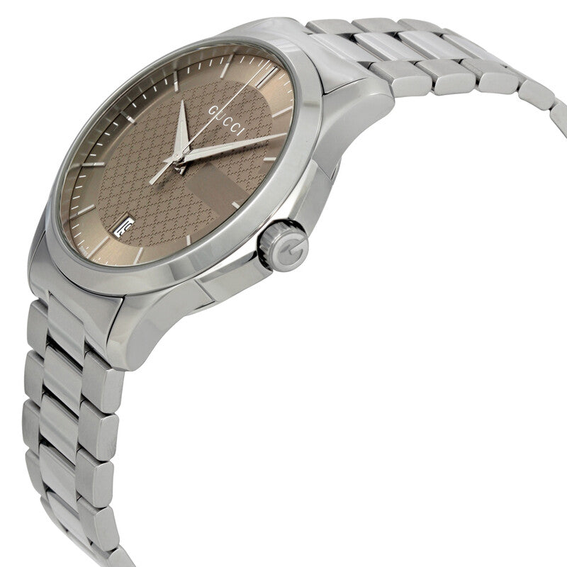 Angled side view of Gucci G-Timeless unisex watch displaying brown dial and stainless steel bracelet