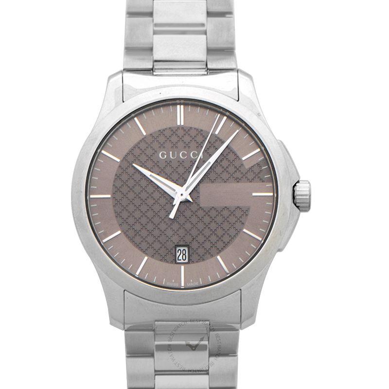 Gucci G-Timeless watch with brown dial, stainless steel case and bracelet, showing GG pattern and date window