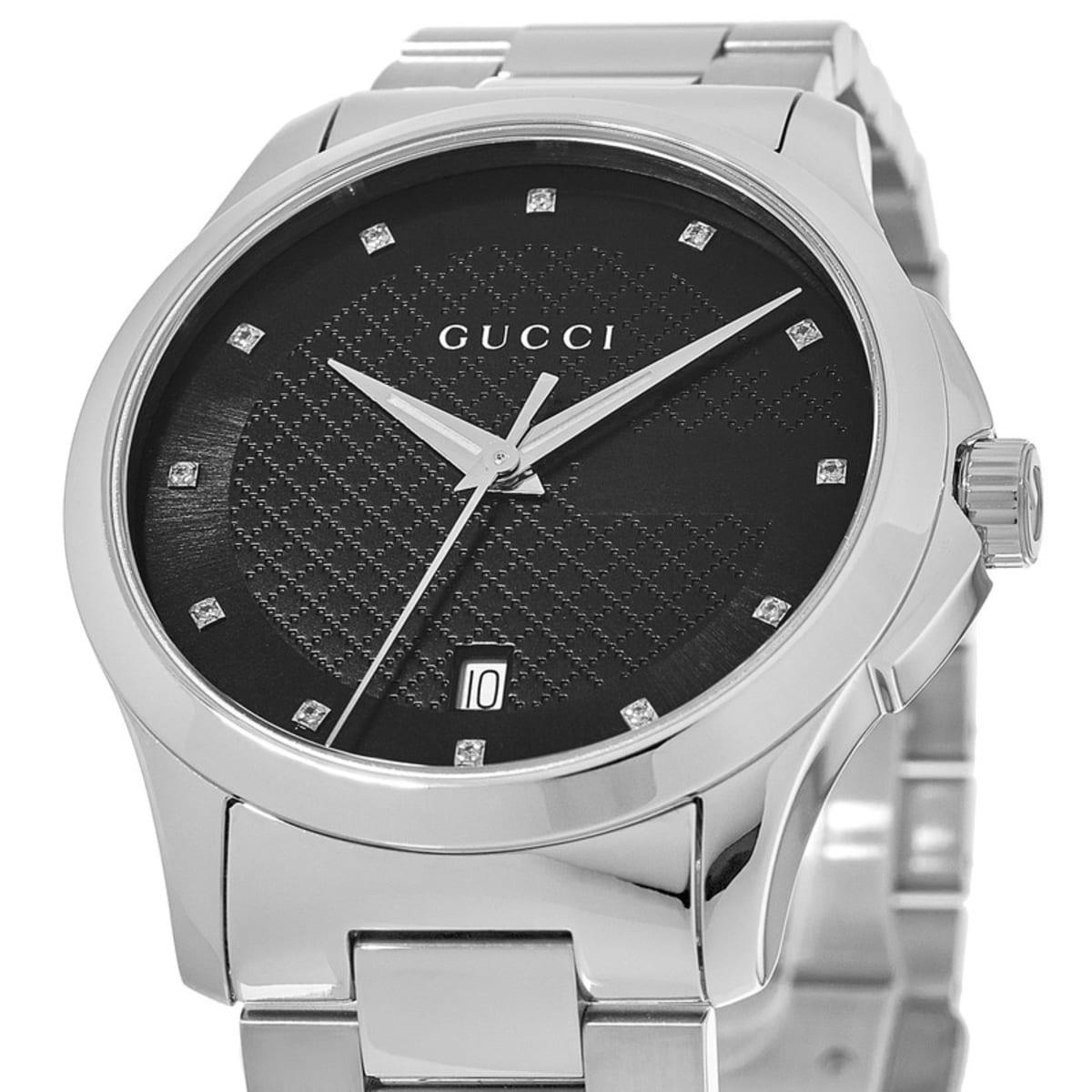 Side view of Gucci G-Timeless watch showing case profile and bracelet