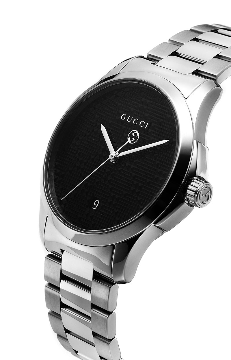 Gucci G-Timeless watch angled view showing silver steel bracelet and black dial