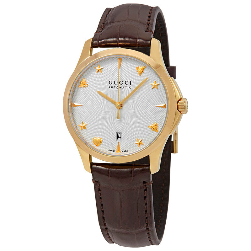 Gucci G-Timeless automatic watch with silver dial, gold indices, and brown crocodile-embossed leather strap