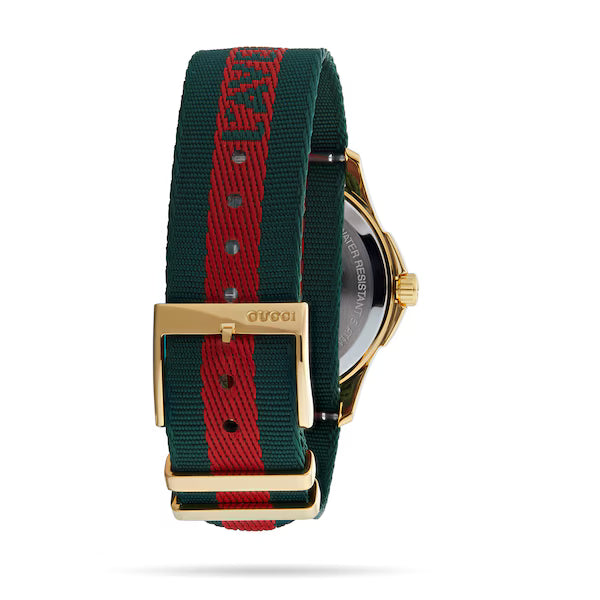 Caseback view of Gucci G-Timeless watch showing strap and Gucci brand markings on buckle