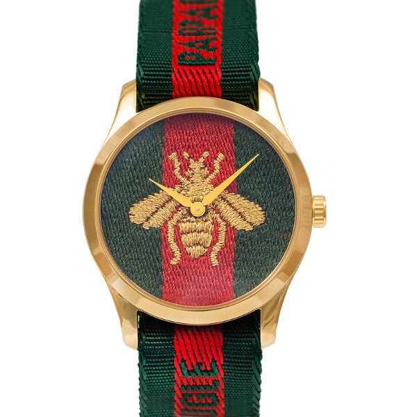 Gucci G-Timeless 38mm watch with gold case, bee embroidered dial in teal and red, green-red striped strap