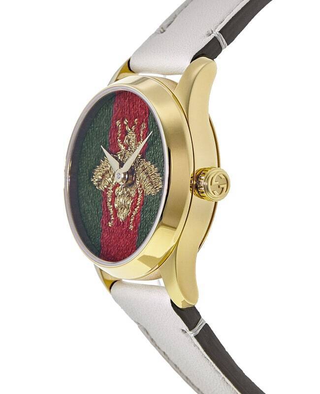 G-Timeless 29mm watch side profile with cream and dark leather strap