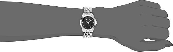 Gucci G Timeless watch worn on wrist, showing black dial and steel strap