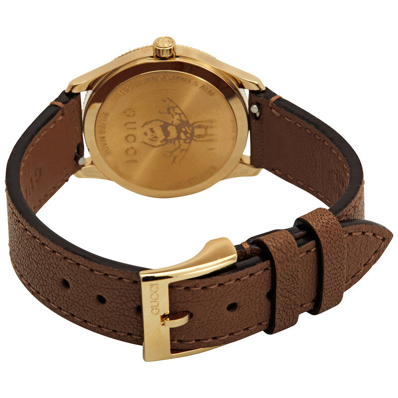 Gucci G-Timeless watch caseback showing gold-tone case and brown leather strap with buckle
