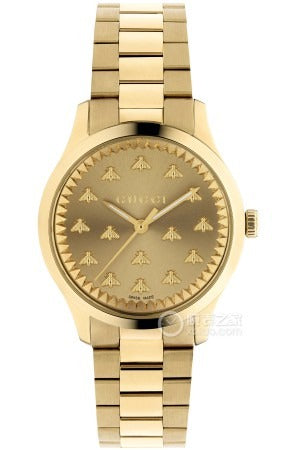 Gucci G-Timeless watch angled view with gold plated case and matching strap
