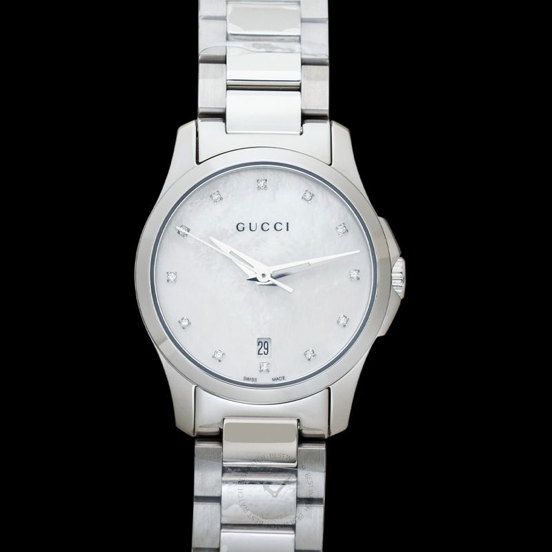 Gucci G-Timeless 27mm watch angled view on black background