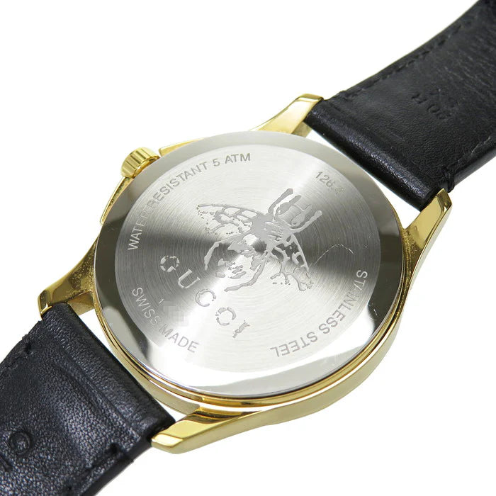 Gucci G-Timeless caseback showing engraved bee emblem and water resistance marking