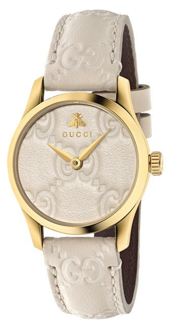 Gucci G-Timeless women's watch with white GG dial, gold-tone case, and white leather strap