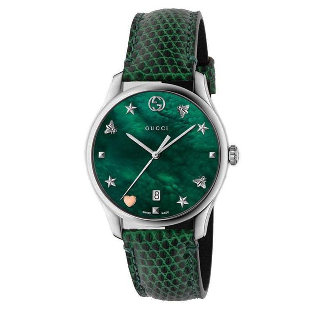 Gucci G-Timeless watch with green mother of pearl dial, star indices, and green leather strap