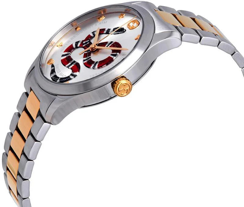 Side view of Gucci G-Timeless watch showing two-tone stainless steel design