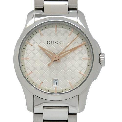 Gucci G Timeless women's watch with champagne dial, date window and stainless steel bracelet
