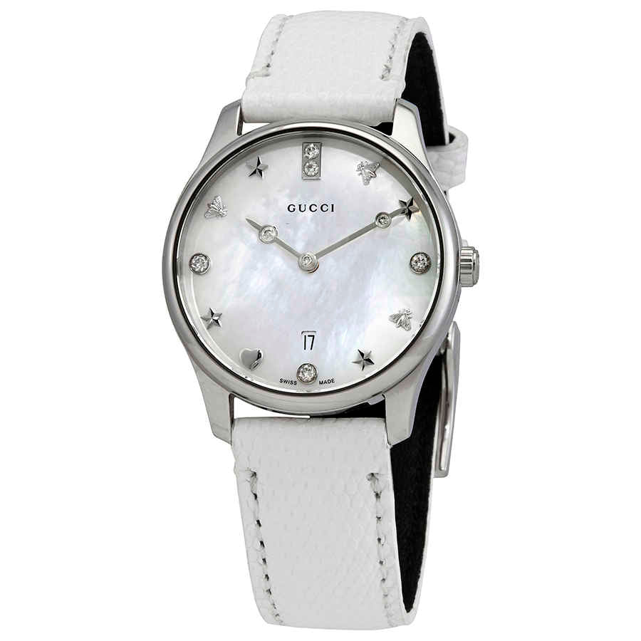 Gucci G-Timeless watch with mother-of-pearl dial, star markers, diamond indices, white strap and stainless steel case